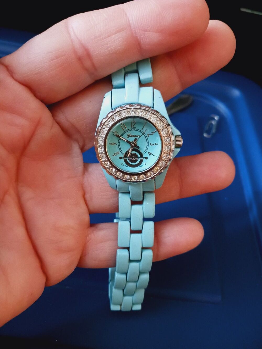 Geneva Platinum watch matching blue link band.